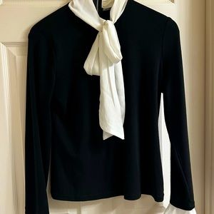 Sweater with lookalike blouse under